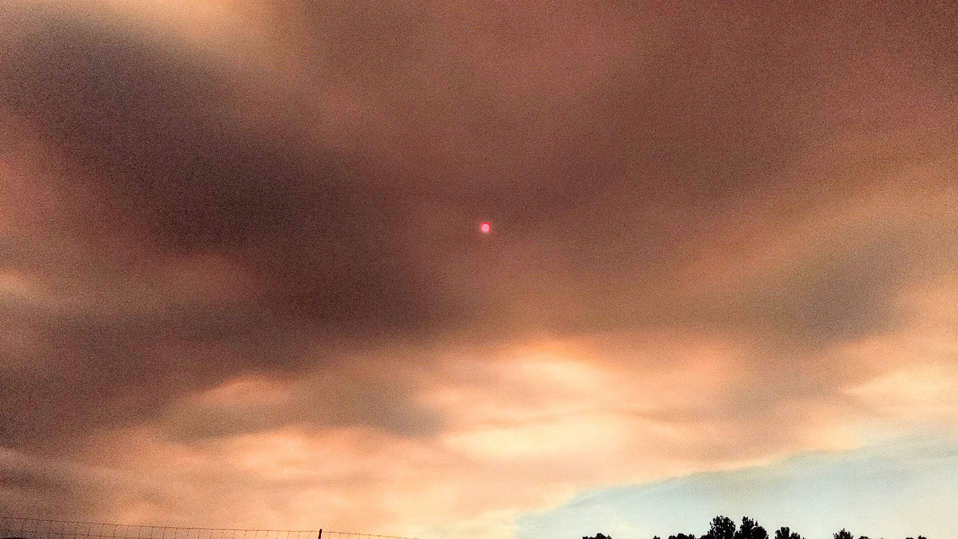 smoke obscures sun